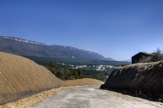 Big unfinished road on the hill at one village in Spain