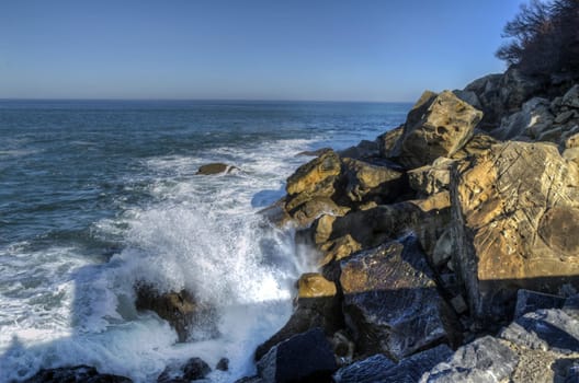 Rocks in the ocean, close to Getaria city in Spain
