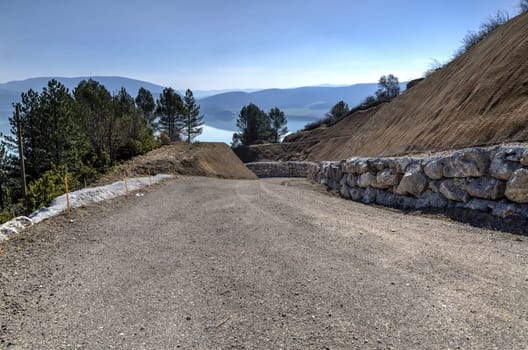 Big unfinished road on the hill at one village in Spain