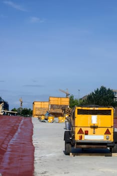 Photograph ingessae a bridge construction site with tools and equipment.