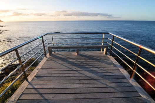 Sunrise on a Pier over Atlantic Ocean in Tenerife Canary Islands Spain