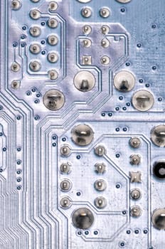 Macro Photo Of Electronic Circuit. Pcb On The Lighting.