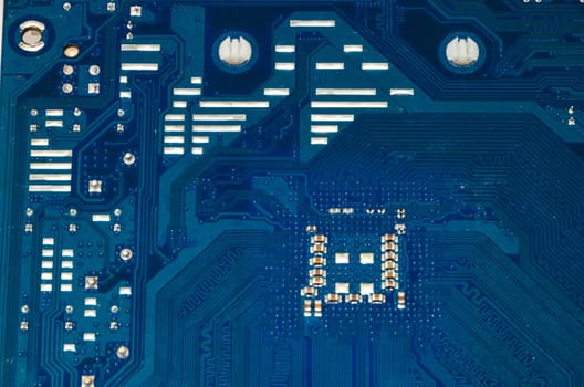 Macro Photo Of Electronic Circuit. Pcb On The Lighting.