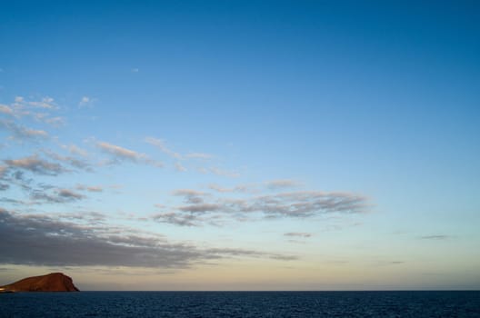 Cloudscape, Colored Clouds at Sunset near the Ocean