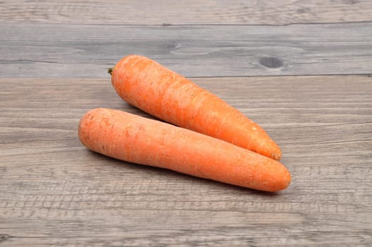 Carrots on wood