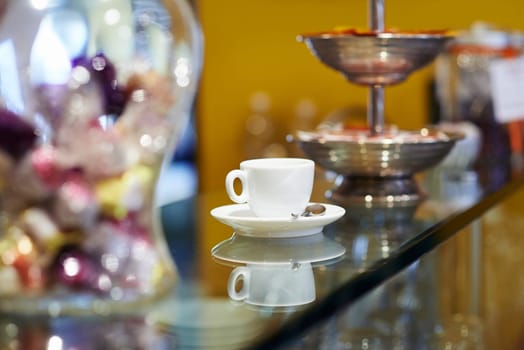 italian espresso coffee cup on counter in cafeteria