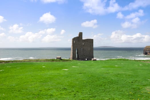 Beautiful view over the Ballybunion beach castle and cliffs in Ireland
