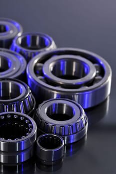 Close-up of various ball bearings in UV light