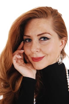 A closeup portrait picture of a classy woman in a black dress, holding.one hand on her face, isolated for white background..