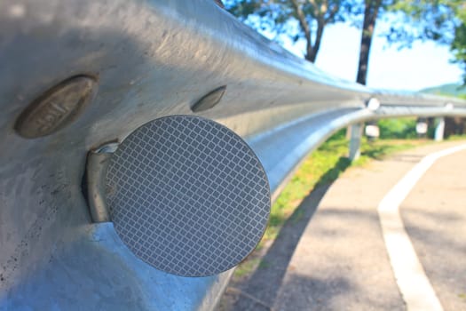 guardrail, is a system designed to keep people or vehicles from straying into dangerous or off-limits areas.