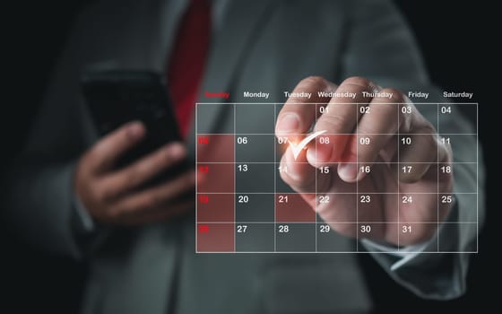 Businessman marking dates on virtual calendar, managing his business schedule, setting reminders for important appointments, creative collage for planning ideas, appointment scheduler
