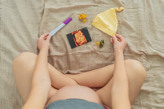 A composition of essential pregnancy attributes: a positive pregnancy test, ultrasound image, tiny pacifier, and a soft baby's cap, embodying the journey to motherhood.