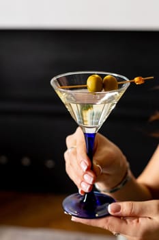 Martini with olives. Classic Shaken Dry Vodka Martini. Space for text