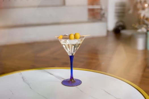 Martini with olives. Classic Shaken Dry Vodka Martini. Space for text