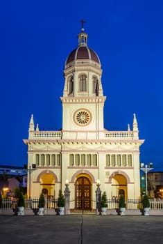 Santa Cruz Church illuminated at twilight in Bangkok Thailand