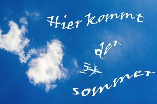 Blue sky with scripture,Here comes the summer in German
