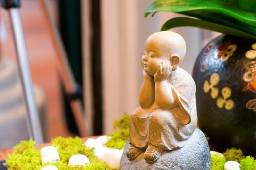 The buddha figurine, the decoration in garden