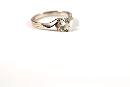 Silver ring with diamond isolated over white