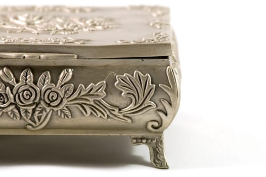 Old silver metallic jewelry casket over white background