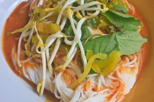 Thai vermicelli eaten with curry and vegetable close up