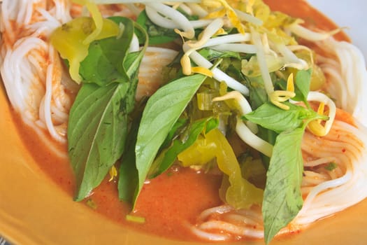 Thai vermicelli eaten with curry and vegetable close up