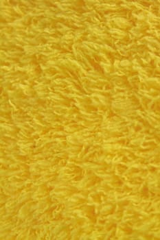 close up Yellow wool yarn background and texture