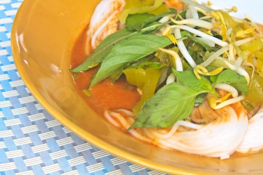 Thai vermicelli eaten with curry and vegetable close up