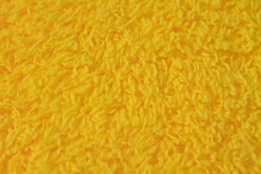 close up Yellow wool yarn background and texture
