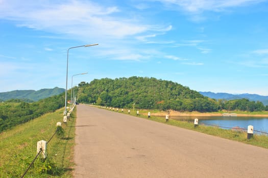 asphalt road and blue sky on top of DAM