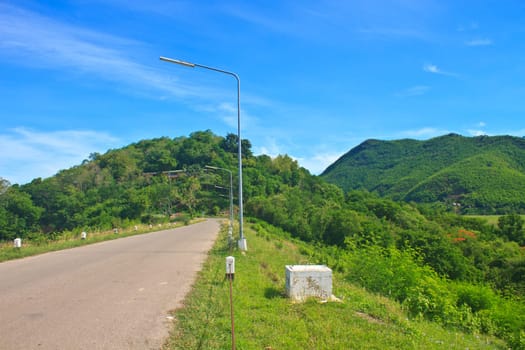 asphalt road and blue sky on top of DAM