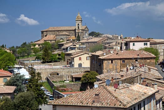 View of Montalcino, one of the romantic small towns near Siena. All potential trademarks are removed.