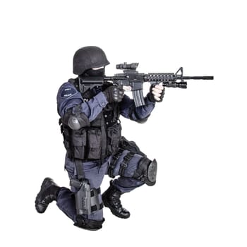 Special weapons and tactics SWAT team officer with his gun
