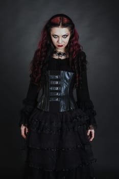Young goth girl with a red hair