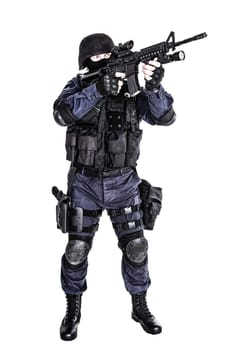 Special weapons and tactics SWAT team officer with his gun