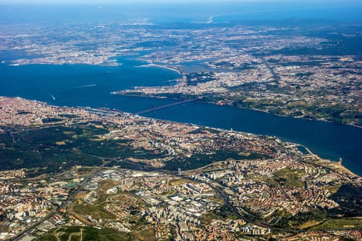 View over Lisbon, Portugal with airport, ponte vasco da gama, river tejo