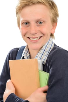 Cheerful teenage student  boy holding books against white background