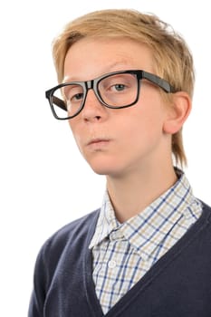 Serious teenage nerd boy wearing geek glasses against white background