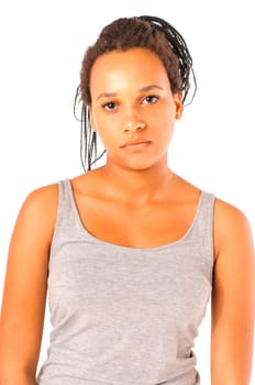 Young african girl with black dreadlocks looks bored at the camera, isolated over white background.