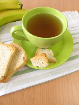 Tea with biscuits and banana
