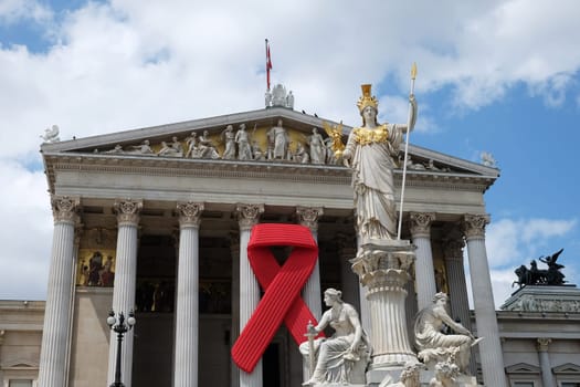 Solidarity with HIV,red ribbon to commemorate the Austrian Parliament