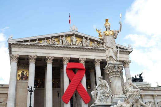 Solidarity with HIV,red ribbon to commemorate the Austrian Parliament
