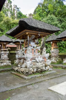 Stairs on a stone wall to an entrance to a house in Bali