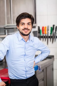 restaurant chef chef owner in the kitchen portrait proudly successful