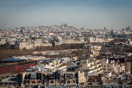 Skyline of Paris with cityscape on the Saine with blue sky in summer