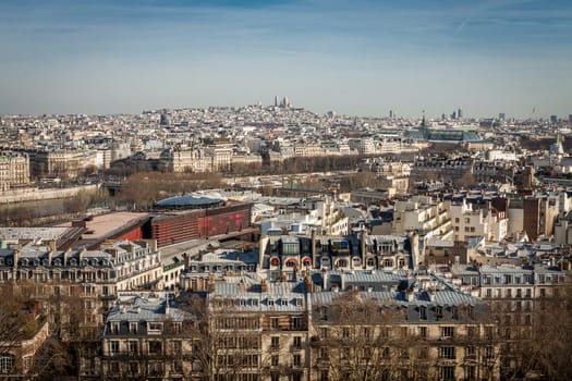 Skyline of Paris with cityscape on the Saine with blue sky in summer