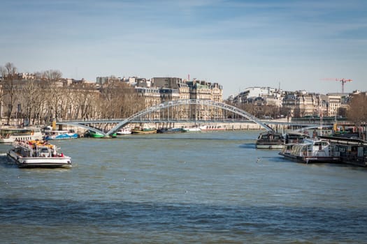 Skyline of Paris with cityscape on the Saine with blue sky in summer