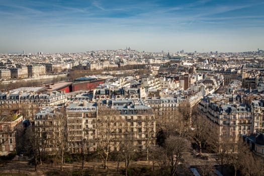 Skyline of Paris with cityscape on the Saine with blue sky in summer