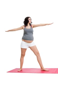 Young attractive mother in swing at training isolated against white background