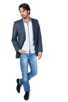 Self-proclaimed man in casual clothes with dark hair and beard isolated against a white background