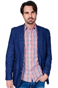 Young man in trendy casual look with dark hair and beard isolated against a white background
